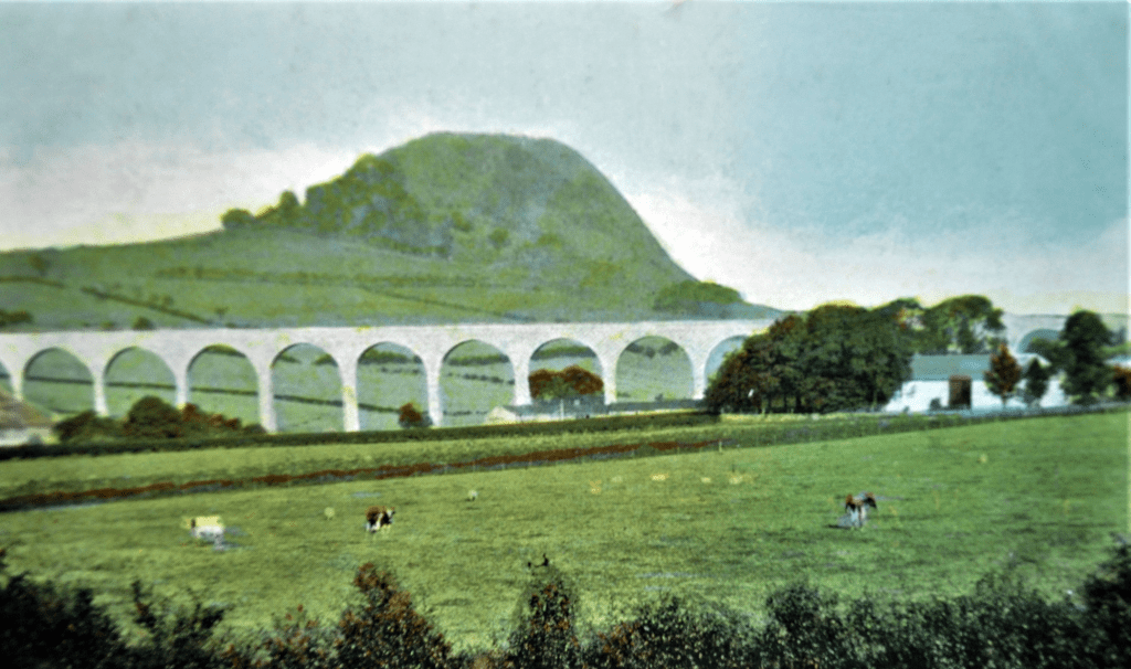 Historic view of Loudoun Hill and the railway viaduct