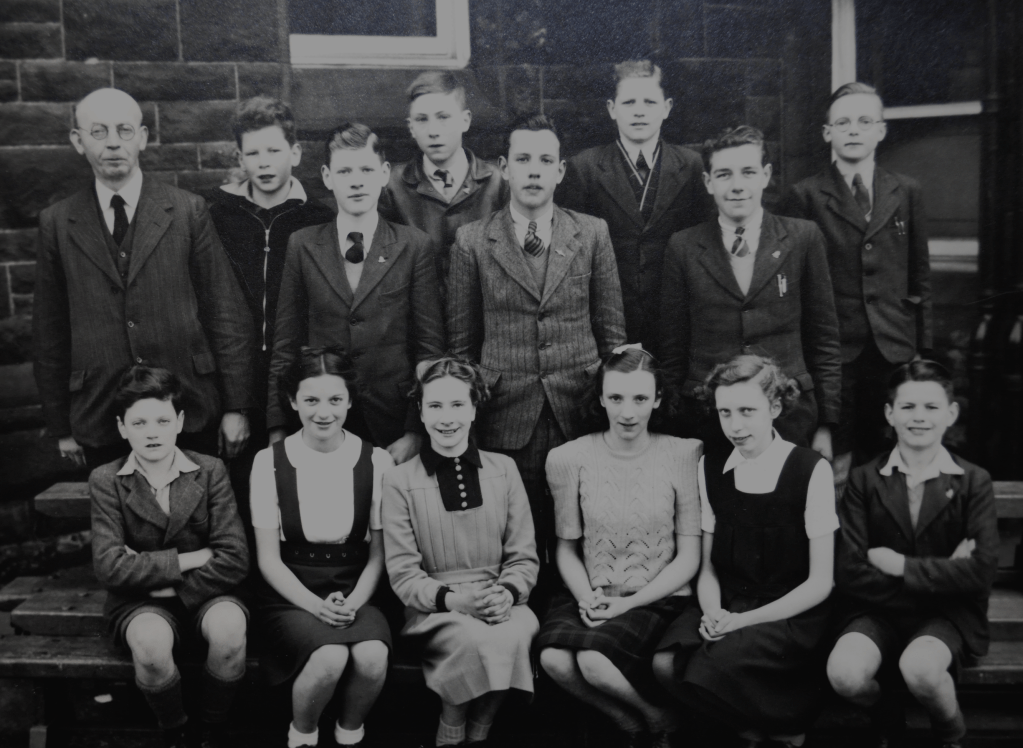 A third-year school class photographed in 1945.