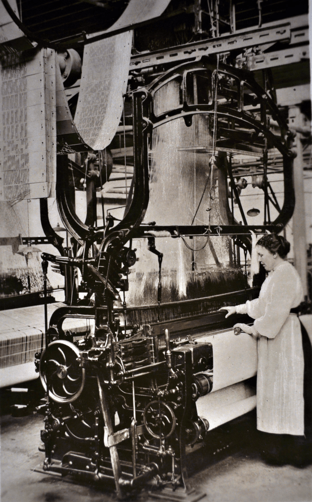 Madras curtains being woven in a Darvel textile works. Date unknown.